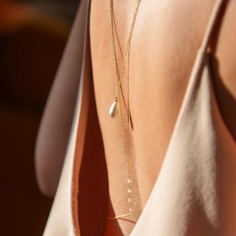 سلسلة ظهر متعددة الطبقات من ال - مراجعة Body Jewelry Necklace وسعره